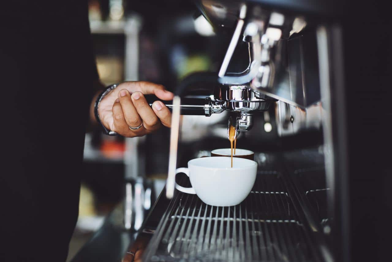 close-up-of-hand-holding-coffee-machine-2