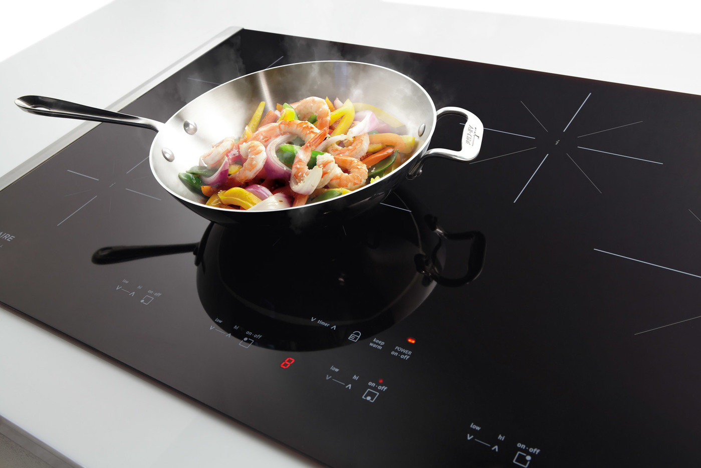 4 Best Induction Woks (Summer 2024) Reviews & Buying Guide